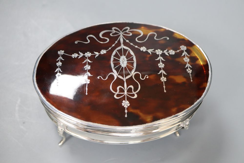 A George V silver and tortoiseshell oval trinket box, Birmingham, 1919, 14.5cm.